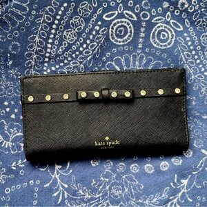 Black kate spade wallet.